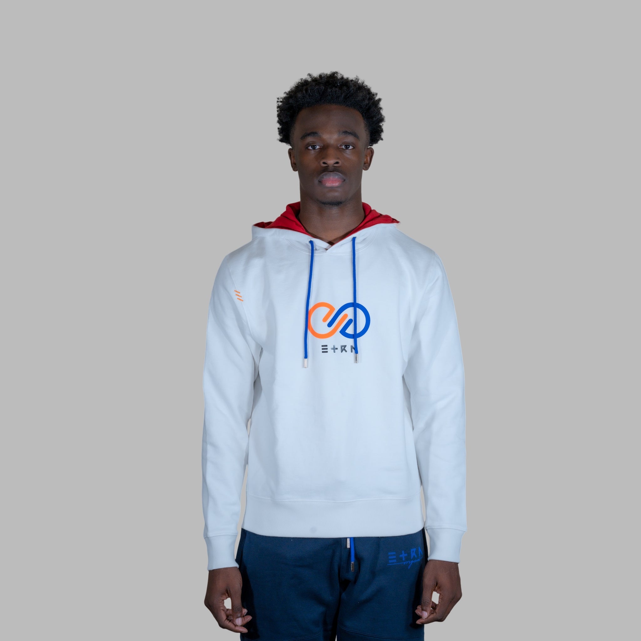 Indulge in luxury with our Classic Logo Hoodie, designed for sophisticated men. This white pure Pima cotton hoodie is a statement piece that embodies elegance and exclusivity.