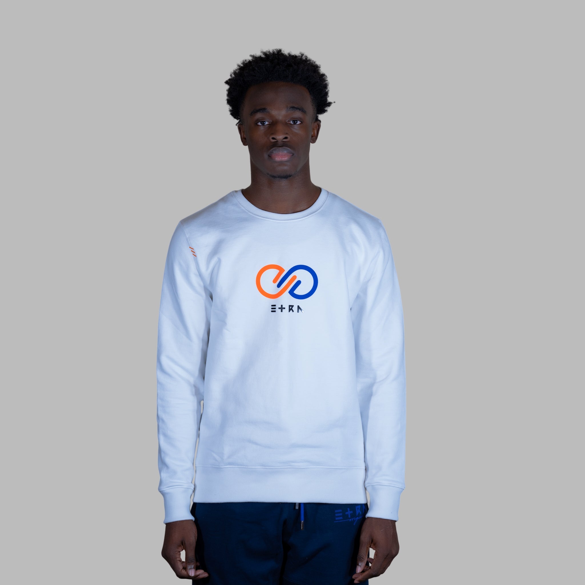 Crafted with the utmost attention to detail and featuring our iconic logo, this white sweatshirt is a statement piece that embodies elegance and exclusivity.