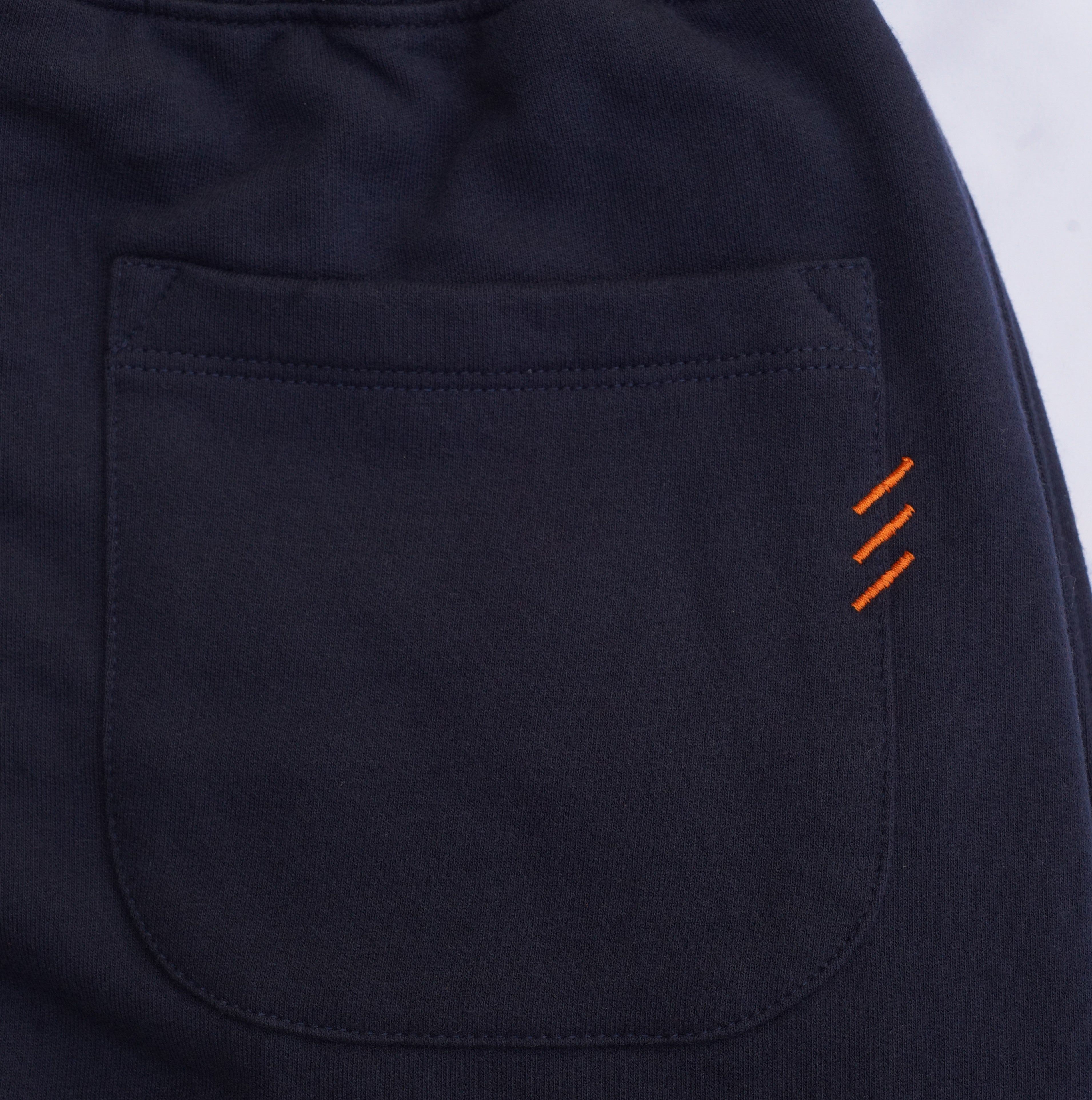 ETRN - Back pocket with bar tack stitching accent.