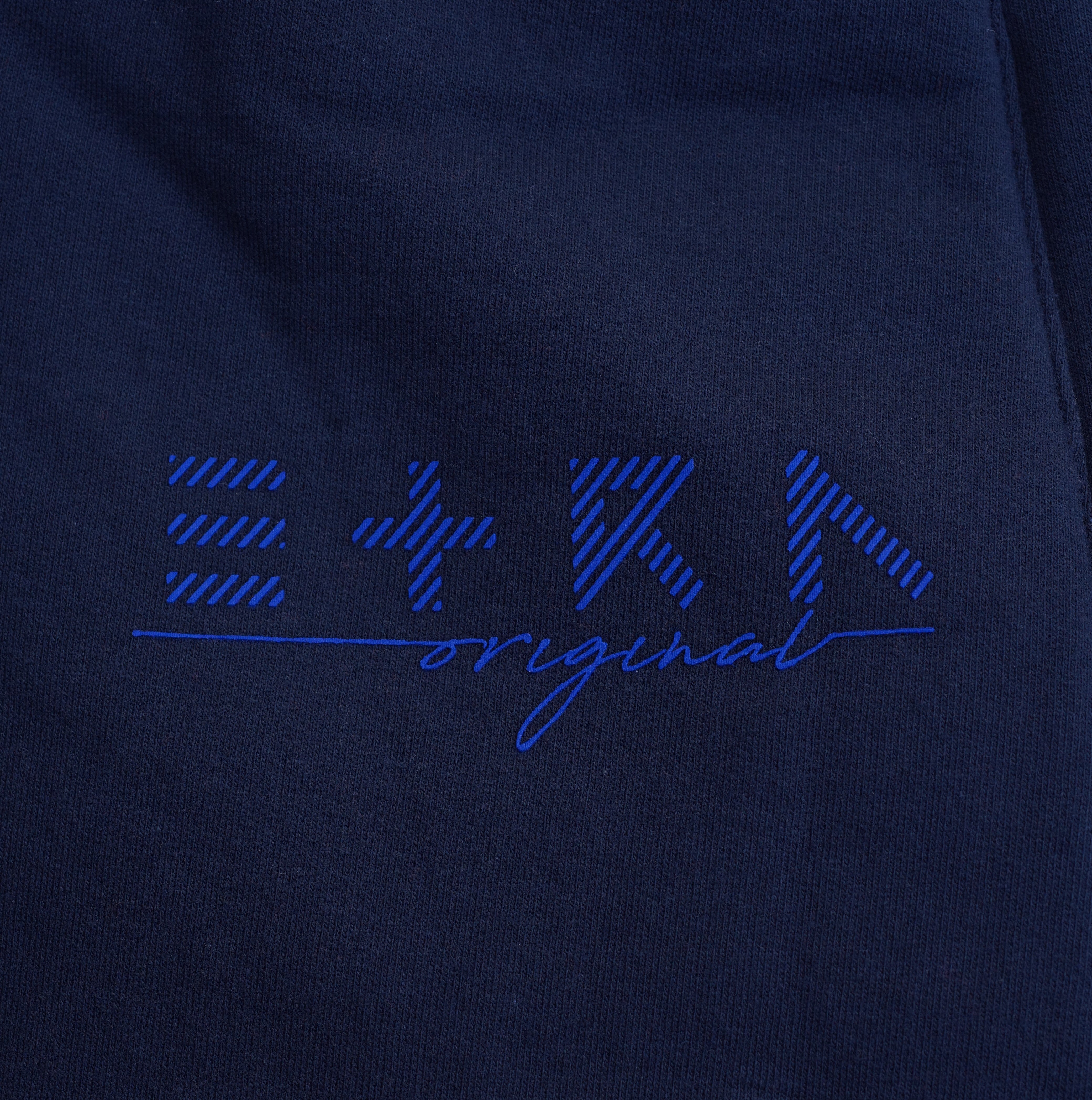 ETRN - ETRN signature logo - Close up view - Blue cotton fabric