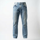 Front view of light blue ETRN denim jeans with a faded wash.